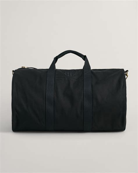 Large Shield Duffle Bag in Black .